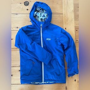 Stio Kids Rafferty Insulated Jacket, Size 14. Missing pocket snap. Color Blue.